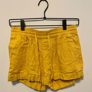 Yellow cotton shorts.